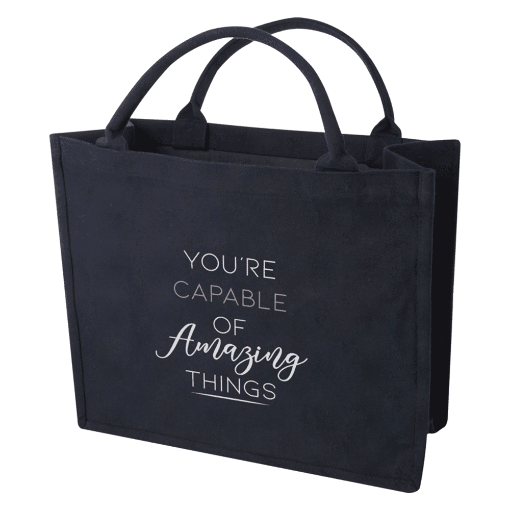 A navy blue tote bag with two handles and a logo, featuring the phrase "You're capable of amazing things."